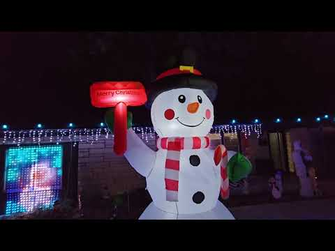 10-foot snowman inflatable: GOOSH tall snowman inflatable with Merry Christmas sign shown during my hands-on review