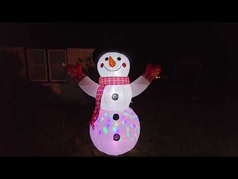 animated snowman inflatable: COMIN 8 FT Christmas Inflatable Snowman Shaking Hand with Built-in LEDs shown during my hands-on review