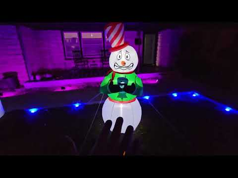 animated snowman inflatable: Elegear 6FT Animated Shivering Snowman Inflatable with Built-in LEDs shown during my hands-on review