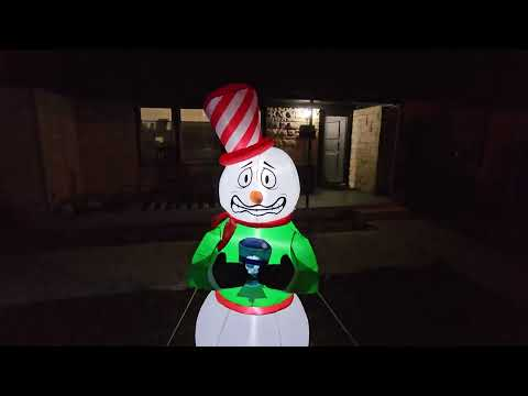 animated snowman inflatable: Elegear 6ft Animated Shivering Snowman Inflatable shown during my hands-on review