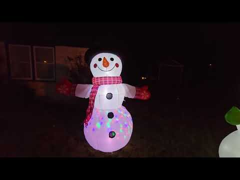 animated snowman inflatable: COMIN 8 FT Christmas Inflatable Snowman Shaking Hand with Built-in LEDs shown during my hands-on review