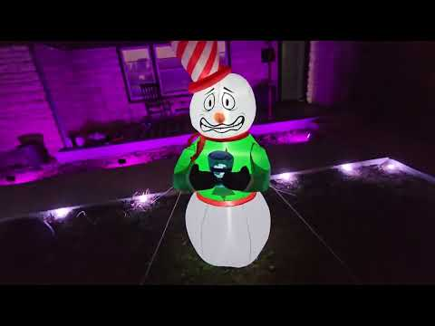 animated snowman inflatable: Elegear 6FT Animated Shivering Snowman Inflatable with Built-in LEDs shown during my hands-on review