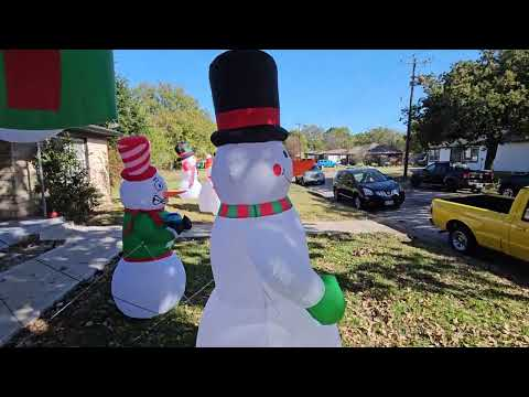 musical inflatable snowman: LOMOHOO 7 ft inflatable musical snowman with swirling LED lighting shown during my hands-on review