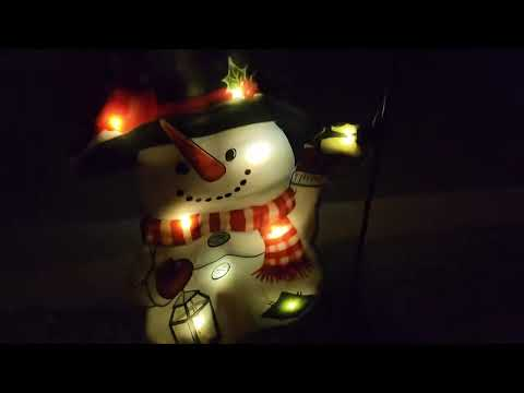 solar snowman garden flag: Solar-powered LED snowman garden flag shown during my hands-on review